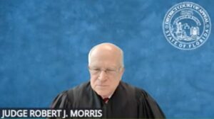 Screenshot of Judge Morris' face taken during a video call.