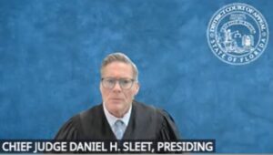 Screenshot of Judge Sleet's face taken during a video call.