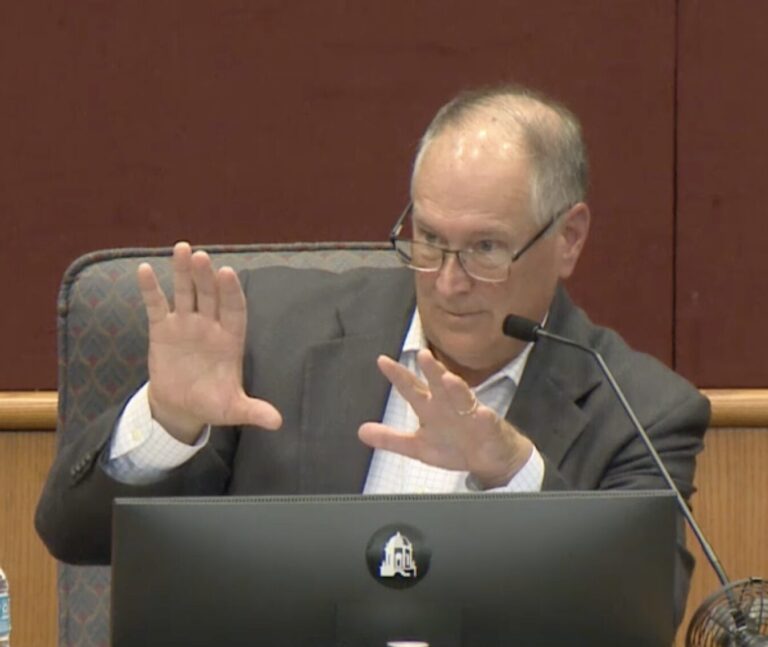 Tom Knight gesticulating while speaking.