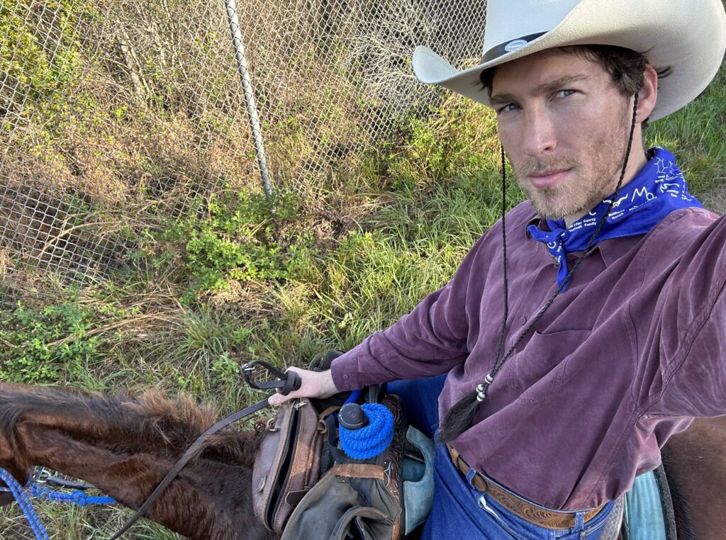 Isaac Eger selfie on horseback.