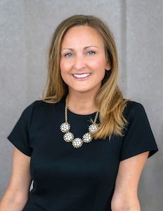 Erin Duggan smiling.