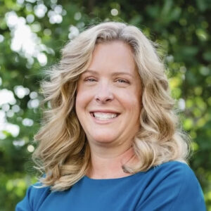 Liz Barker smiling.