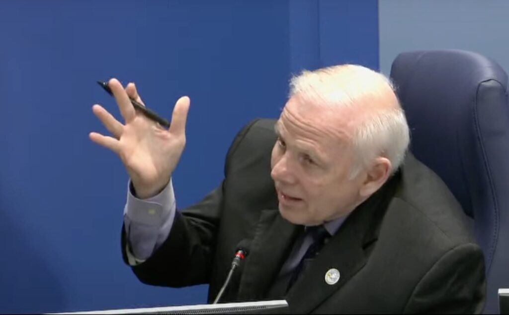 Bob McCann gesticulating while speaking.