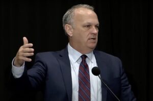 Richard Corcoran gesticulating while speaking.