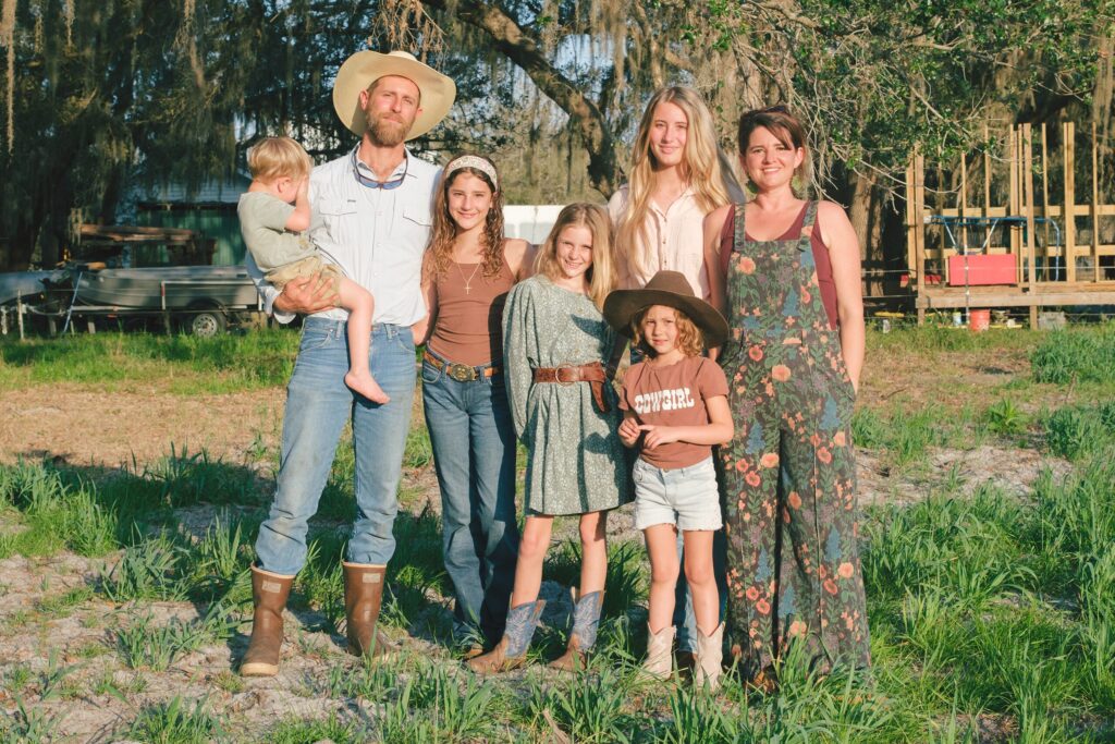 Family portrait of the Clarksons, the family that owns Grove Ladder Farm.
