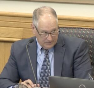 Tom Knight in a commission meeting.