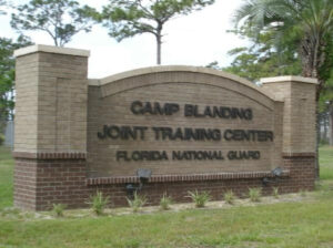 A sign that reads "Camp Blanding Joint Training Center / Florida National Guard".