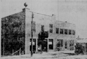Black-and-white photo of a hotel.