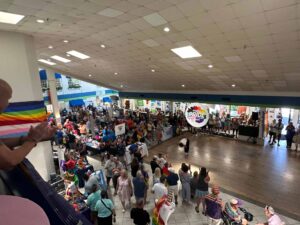 A convention hall packed for a pride event.