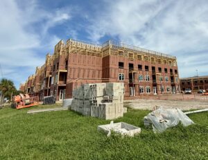 An apartment building still early on in construction.