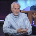 Rob Lorei gesticulating while speaking.