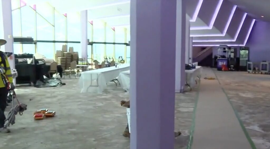 Photo of the inside of the Van Wezel, floors bare after severe flood damage.