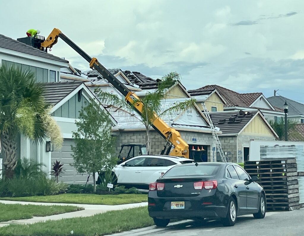 Ongoing construction of a row of single-family homes.