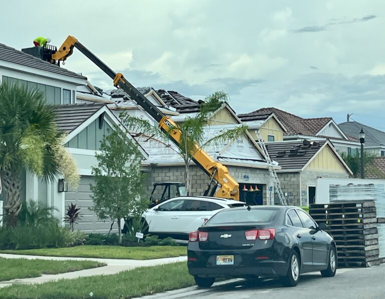 Ongoing construction of a row of single-family homes.