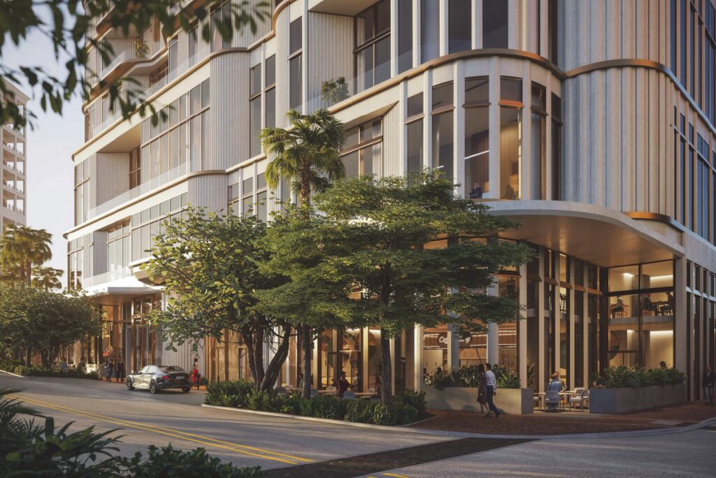 Lifelike rendering of a luxury tower viewed from street level.