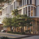 Lifelike rendering of a luxury tower viewed from street level.