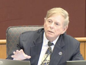 Mark Smith gesticulating while speaking.
