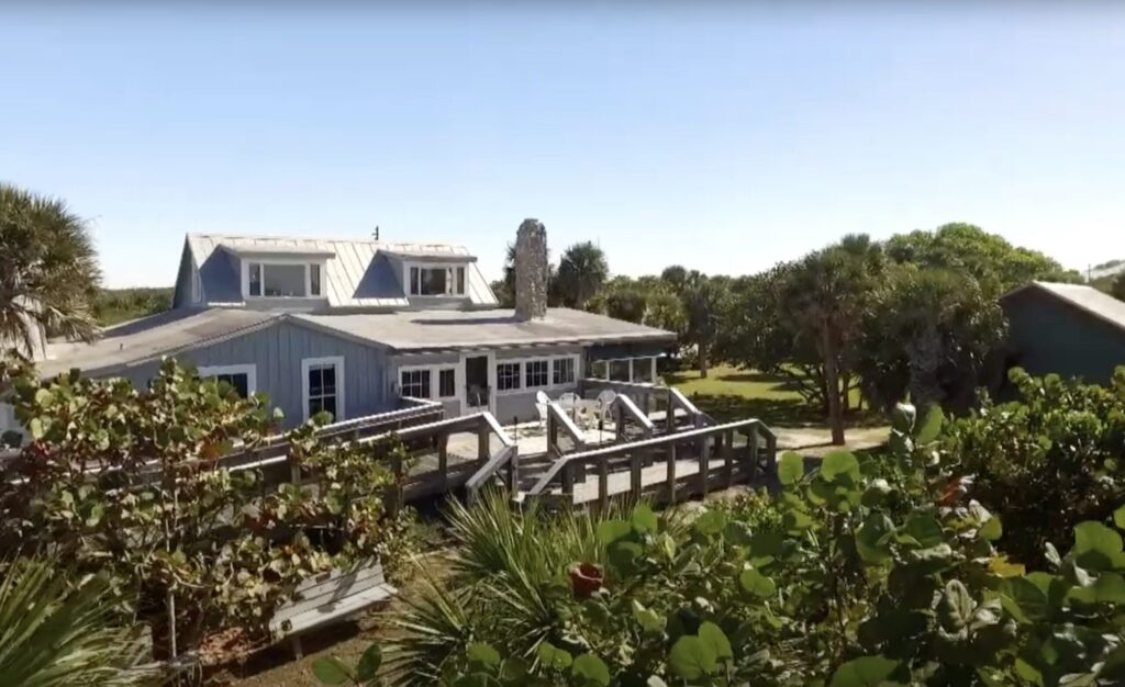 Photo of a building with a wooden deck.
