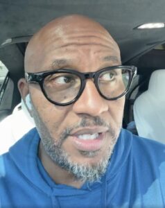 Kevin Lumpkin speaking in a car.