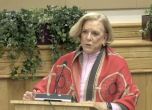 Commissioner B.J. Bishop speaking at a podium.