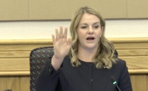 Fiona McFarland gesticulating while speaking.