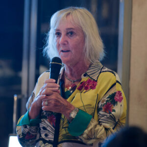 Meg Lowman speaks into a microphone.