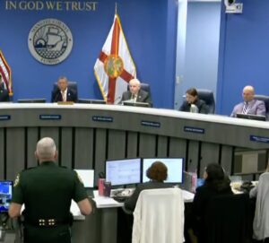 Commissioners George Kruse, Bob McCann, Amanda Ballard, and Jason Bearden in the Board of County Commissioners Chambers.