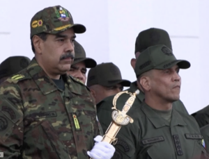 Maduro holds Bolívar's sword.