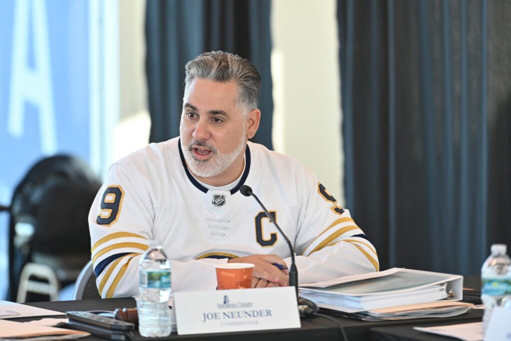Joe Neunder wearing a Buffalo Sabres jersey.