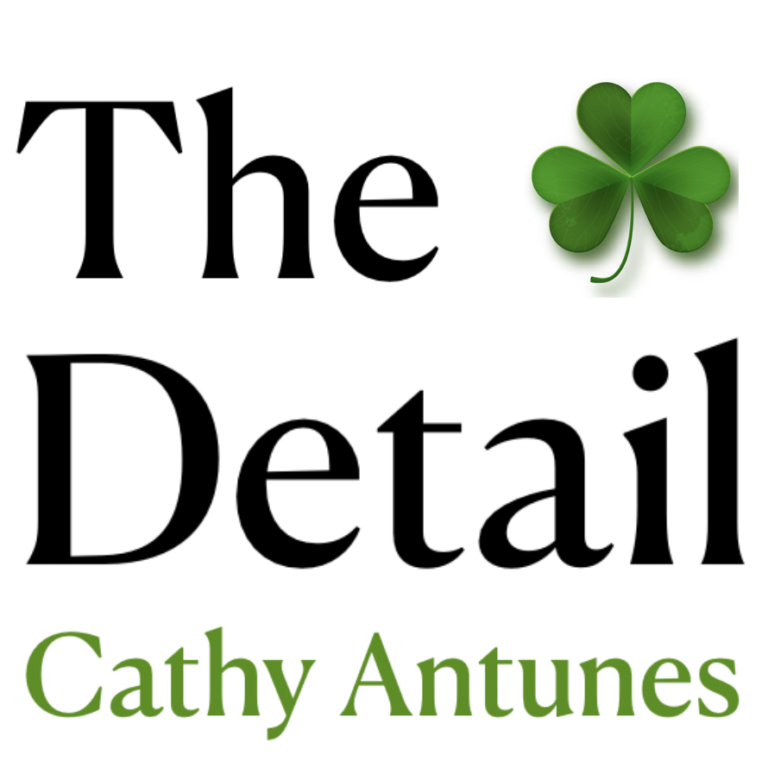 Logo for The Detail with Cathy Antunes featuring text and a shamrock illustration.