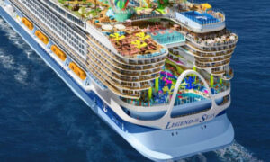 A colorful cruise ship on the water.