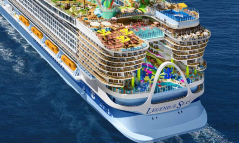 A colorful cruise ship on the water.