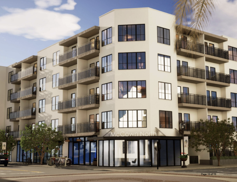 Lifelike rendering of a housing complex from near street level.