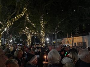 A crowd gathered in downtown Sarasota for a candlelit vigil.