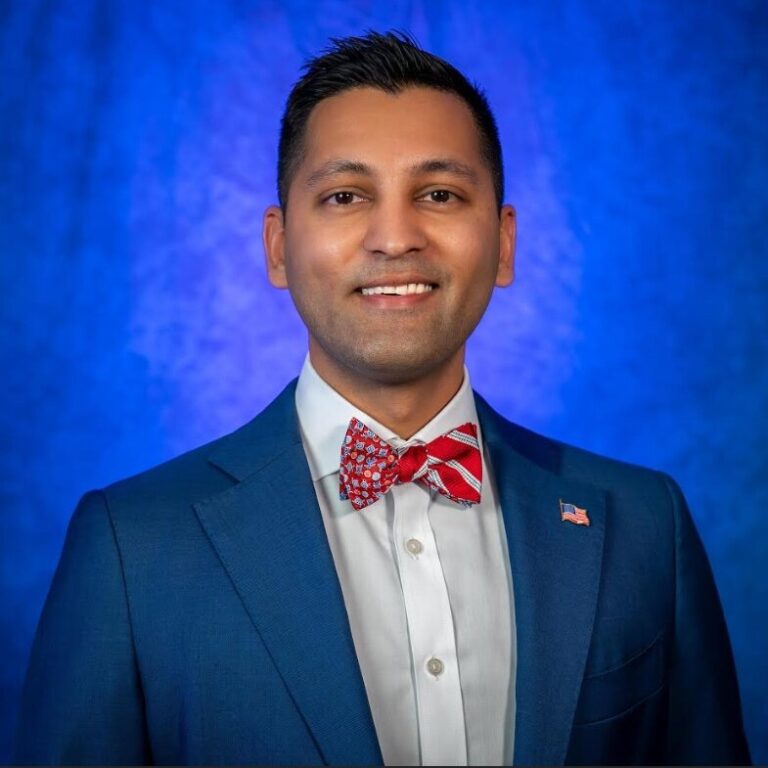 Tal Siddique smiling.