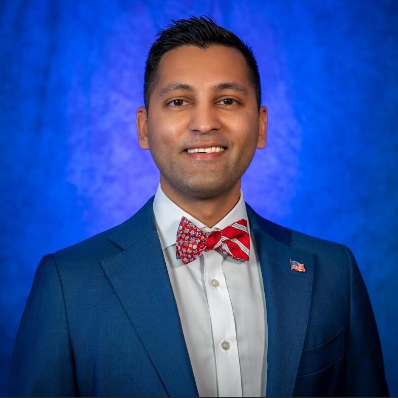 Tal Siddique smiling.