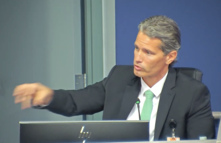 Terry Connor gesticulating while speaking.