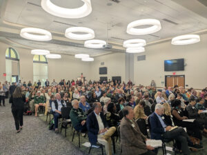 A full crowd at a conference hall.