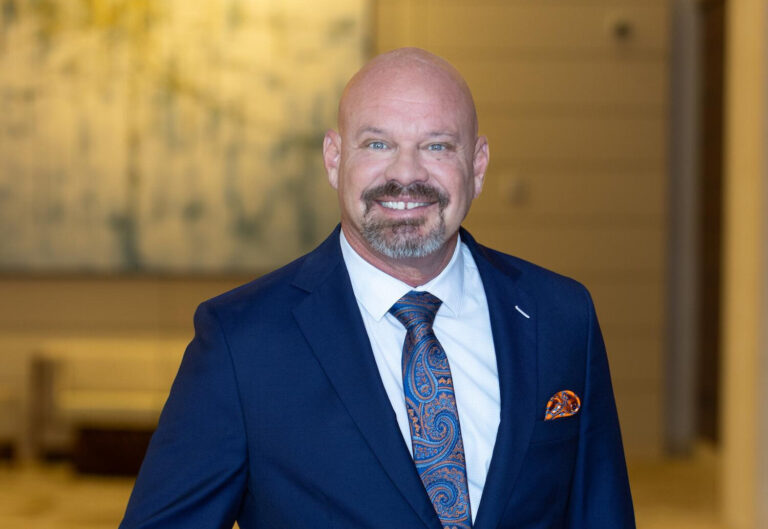 Tony Barrett smiling.