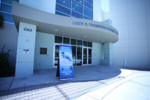 A promotional sign for the Sarasota Film Festival outside Ringling College's Academic Center.