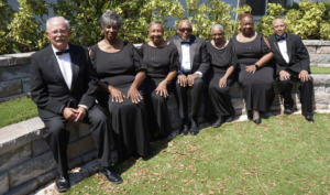 Members of the Gulf Coast Community Choir smiling.