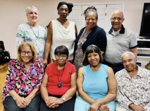 Members of the Gulf Coast Community Choir smiling.