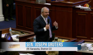 Joseph Gruters speaking on the Senate floor. A watermark indicates this is a screencap from The Florida Channel.