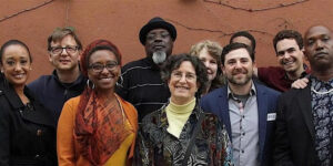 A group of people smiling for the camera.