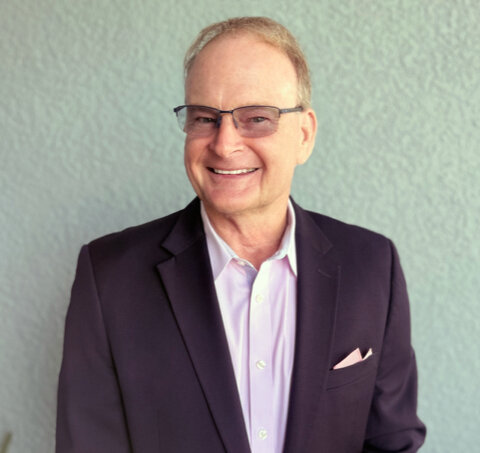 John Calovich smiling.