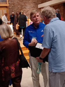 Mark Smith in a crowd at a church.