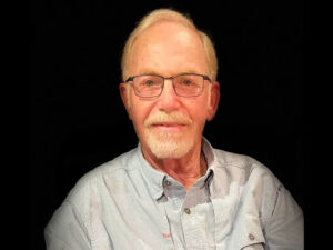 Norman Olshansky.