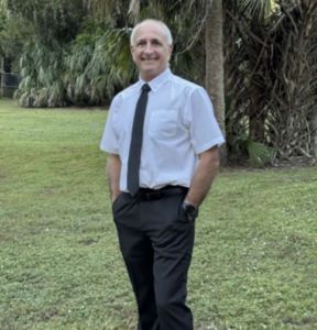 Douglas Dixon smiling.