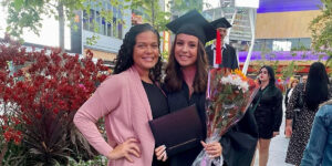 Kristina Sargent with her daughter, who wears a graduation cap and gown.