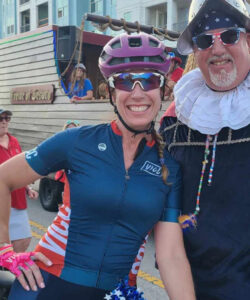 Dawn Zielinski in cycling gear smiling.